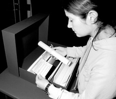  Specially trained library assistants collect the manuscripts from the basement strongroom storage